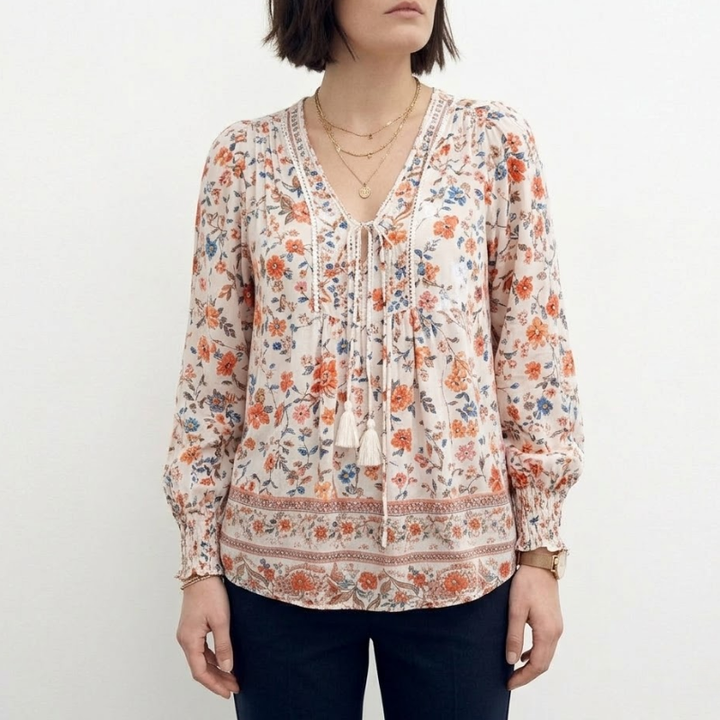 Loose-fitting blouse with V-neck